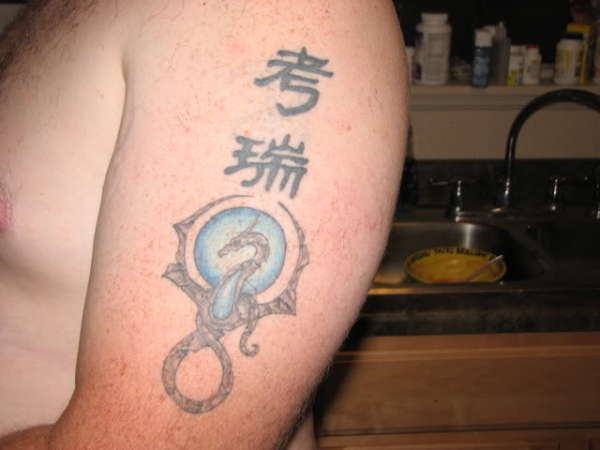 Dragon and name tattoo