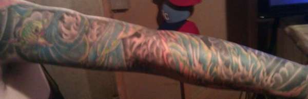 Left Arm tattoo