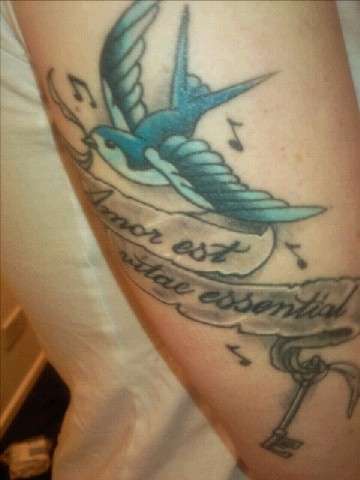 Love is the essence of life tattoo