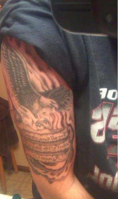 finished script and eagle tattoo