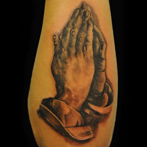 praying hands tattoo