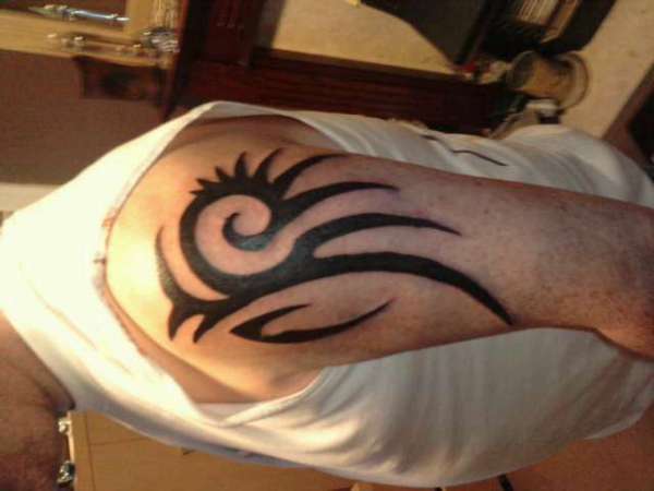 tribal arm tattoo