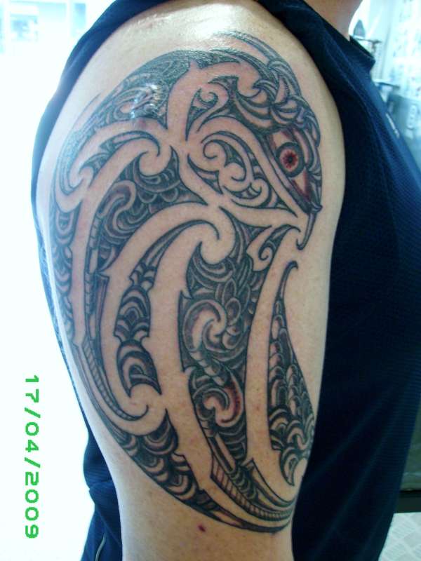 tribal islander design mens arm tattoo