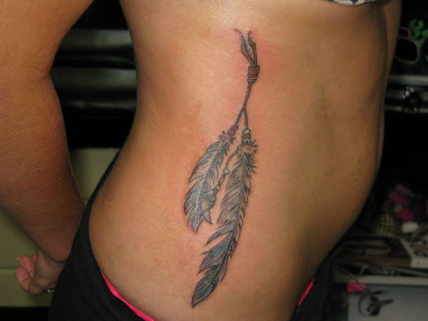 Feathers tattoo