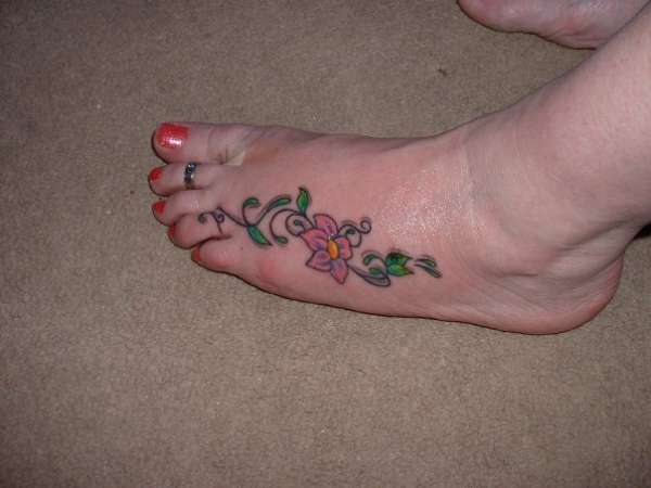 Flower on my foot tattoo