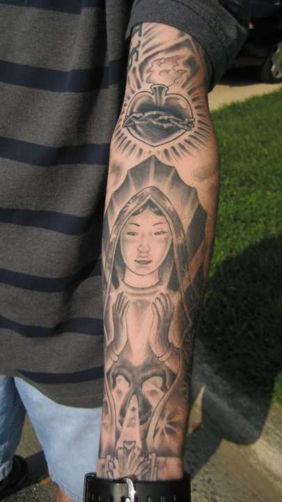 Left Arm tattoo