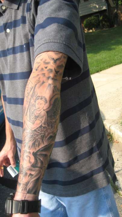 Left Arm tattoo