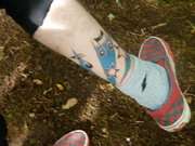 Leg wrap tattoo