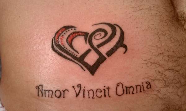 Love Conquers All tattoo