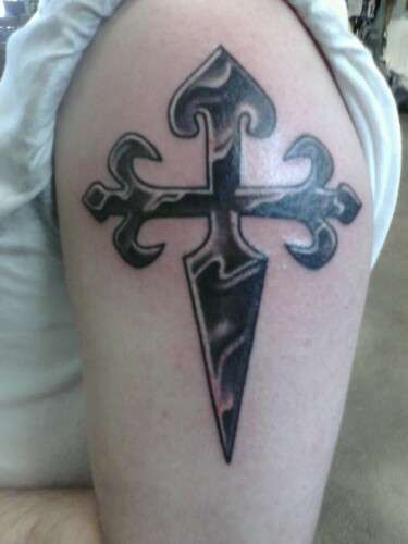 Sword/cross tattoo