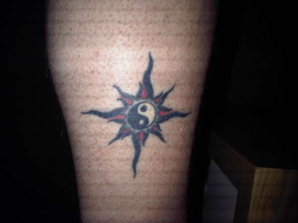 colin 10 ying yang sun tattoo