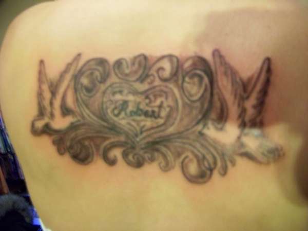 heart with doves upper back tattoo