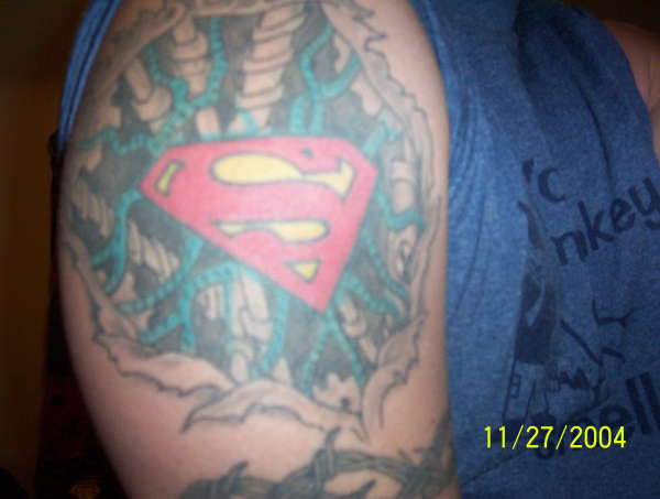 Superman Tear out tattoo