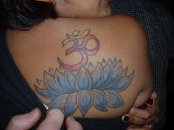 lotus/ohm tattoo