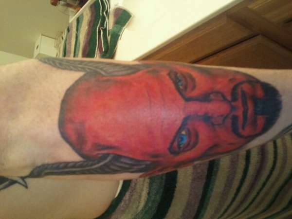 outside of right arm tattoo