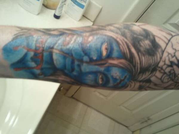 right arm with color tattoo