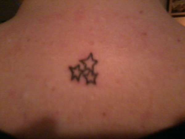 stars on neck tattoo