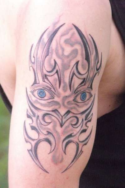 warrior mask by Lenny at Dog Pound Tattoo tattoo