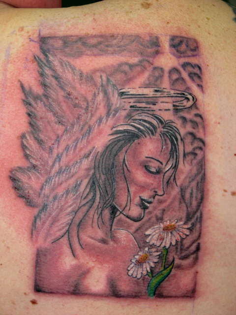 Angel with Daisies tattoo