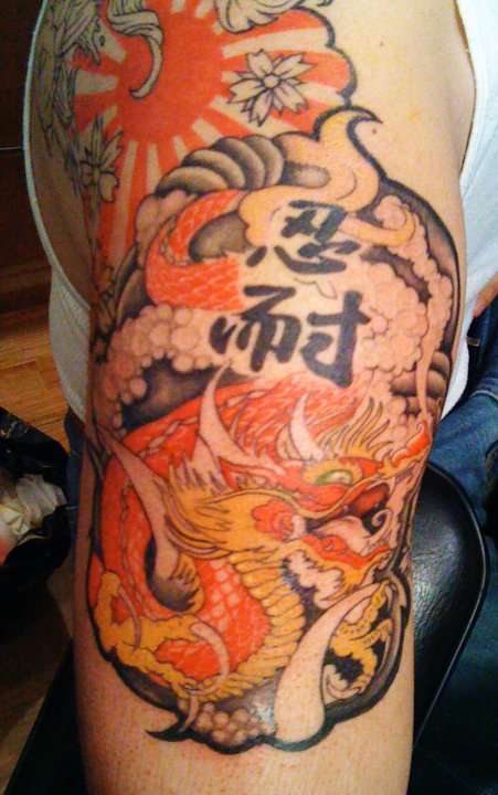 Close Up of Erics Dragon - Munch Art tattoo