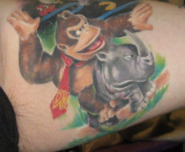 Donkey Kong on a rhino tattoo
