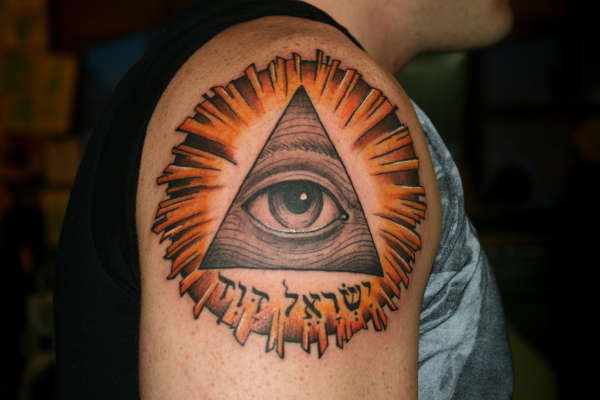 Eye of god, burst with hebrew lettering tattoo
