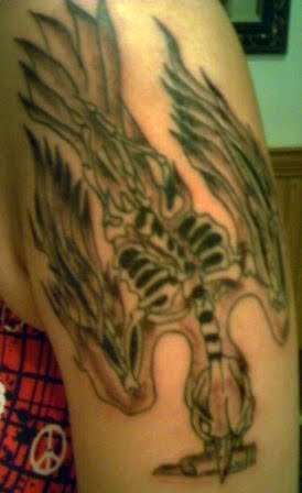 Lamb of God bird tattoo