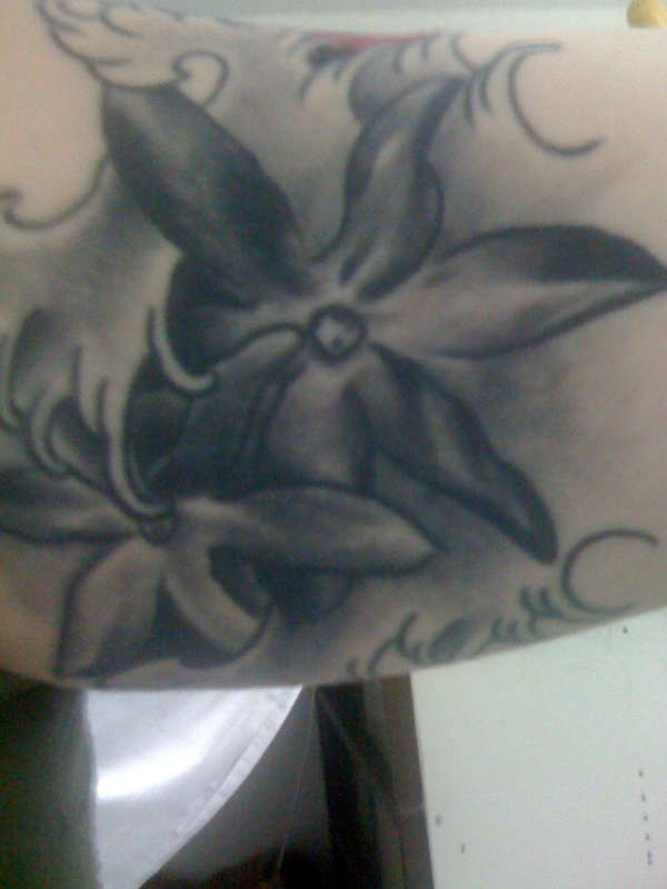 Narcissus in a wave tattoo