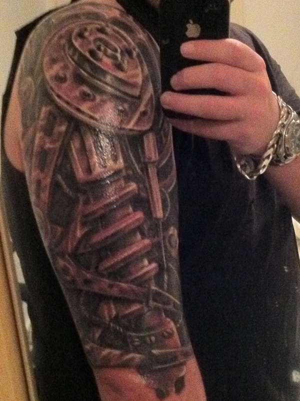 Mechanical arm tattoo