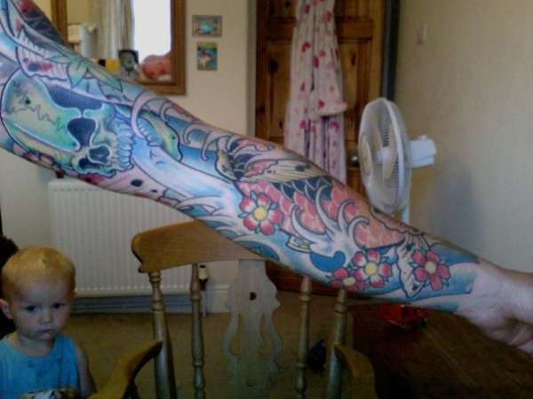 full jap sleeve with koi skull and cherry blossoms tattoo