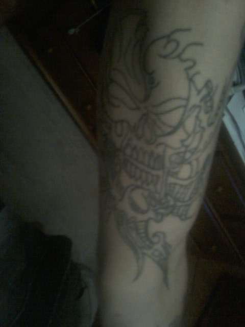 in side of right arm(bio skall) tattoo