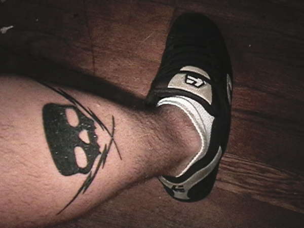 skull and bolts tattoo