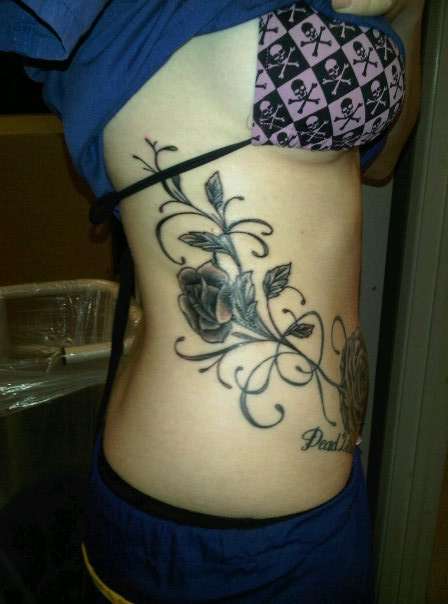 roses & swirls tattoo