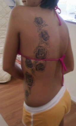 side roses tattoo