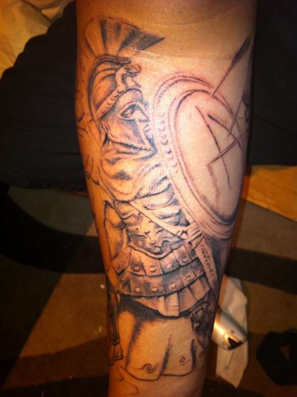 start of spartan sleeve tattoo