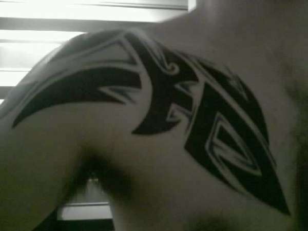 tribal with blue tattoo