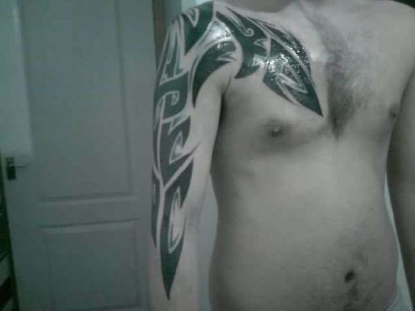 tribal with blue tattoo