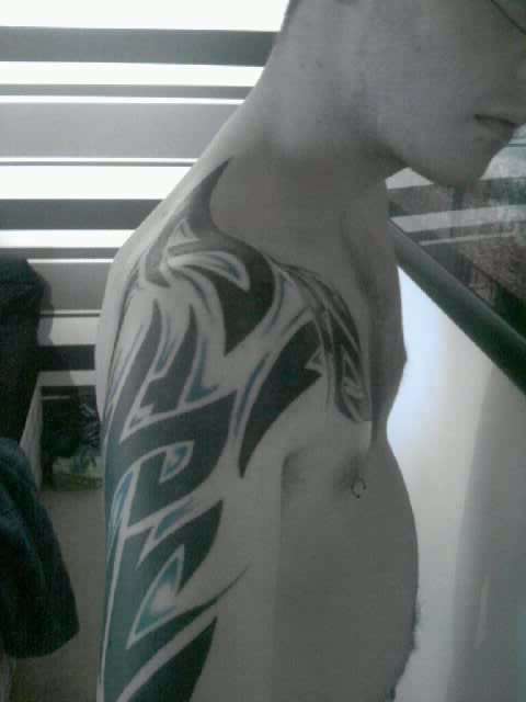 tribal with blue tattoo