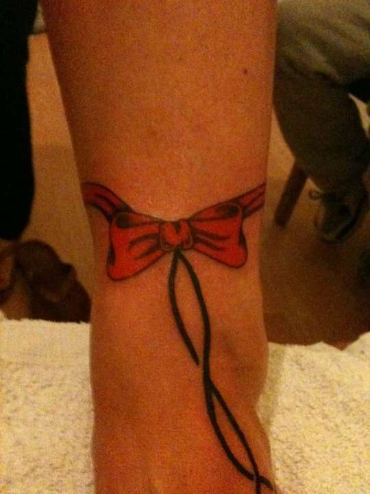 Ankle bow tattoo