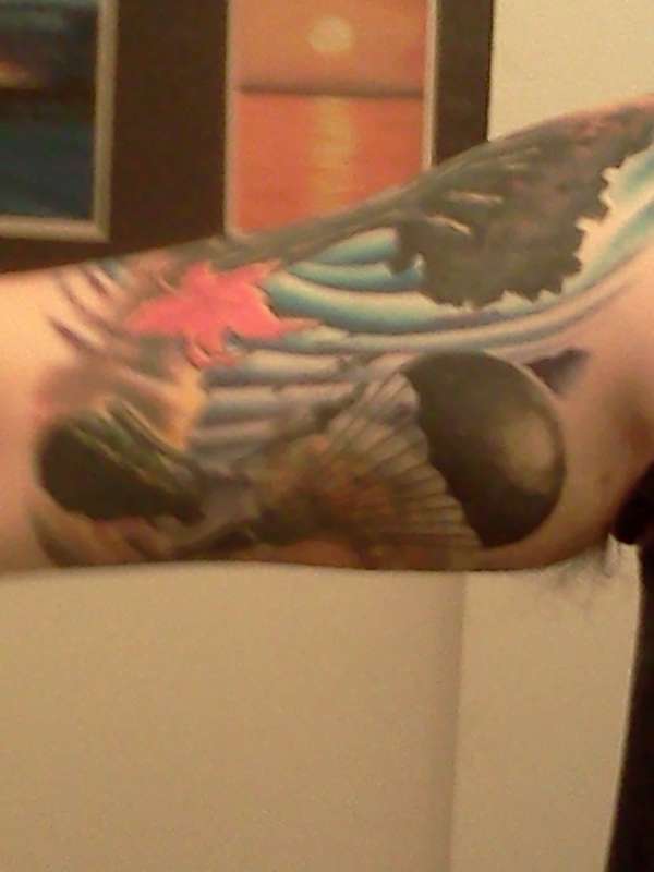 Autumn Bombers Left arm tattoo