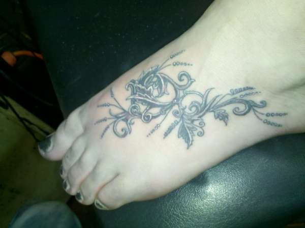 Foot tatt tattoo