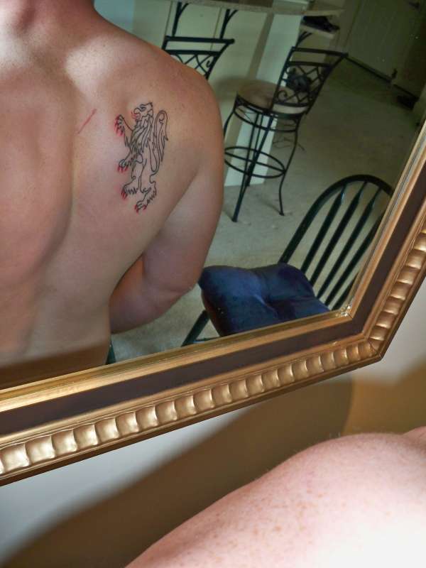 From my family crest left side of back tattoo