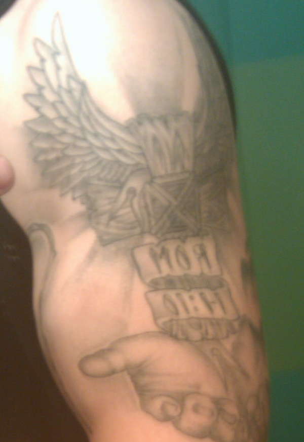 Romans 14:10 cross/wings/hands tattoo