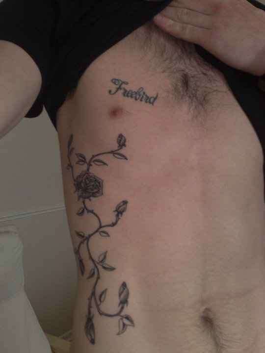 Roses and Freebird tattoo