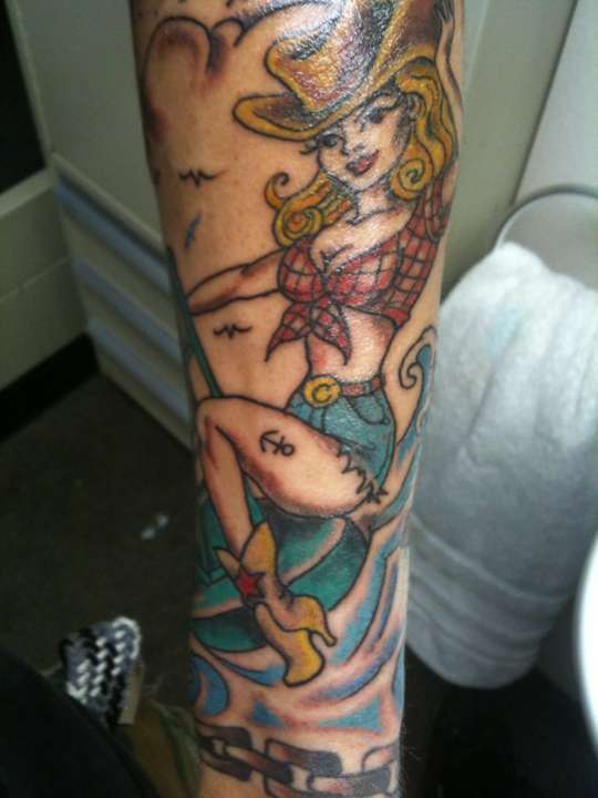 cowgirl riding buoy tattoo