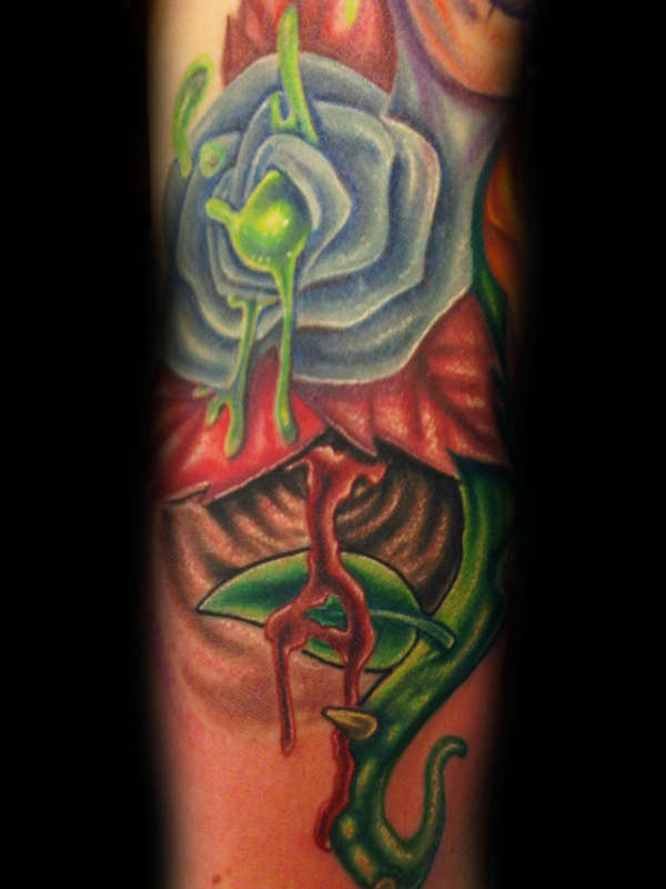 rose drippin tattoo