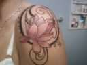 shoulder cap tattoo