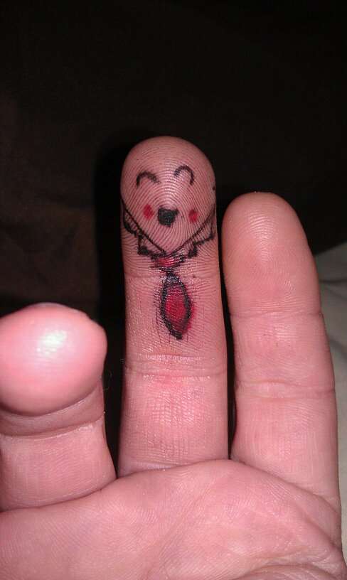 Finger puppet tattoo