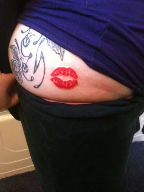 Red lips tattoo