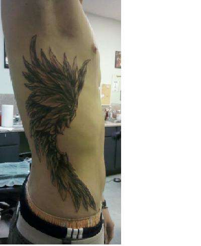Sidewing tattoo